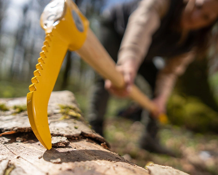 Ochsenkopf forestry tool being used to move a log