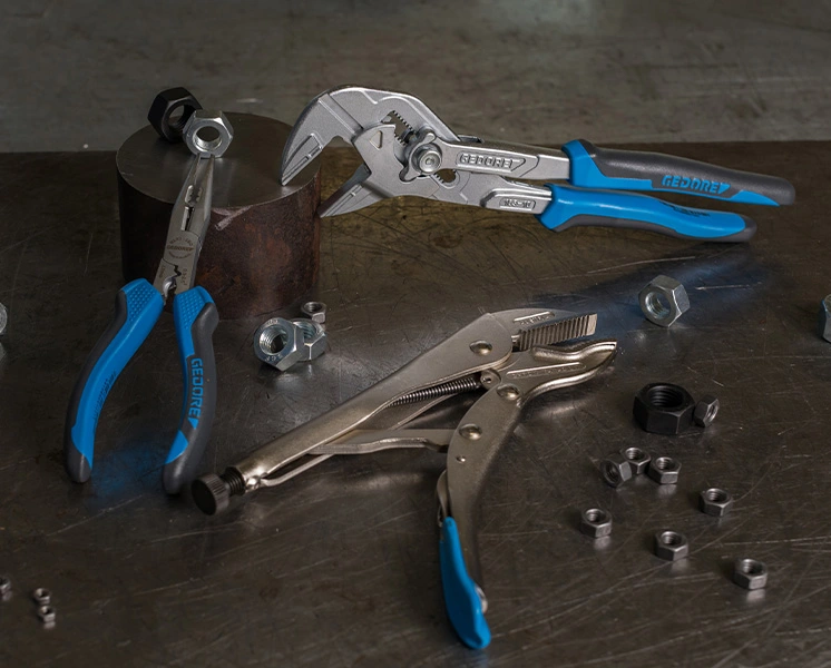 GEDORE pliers with nuts and bolts on a workbench