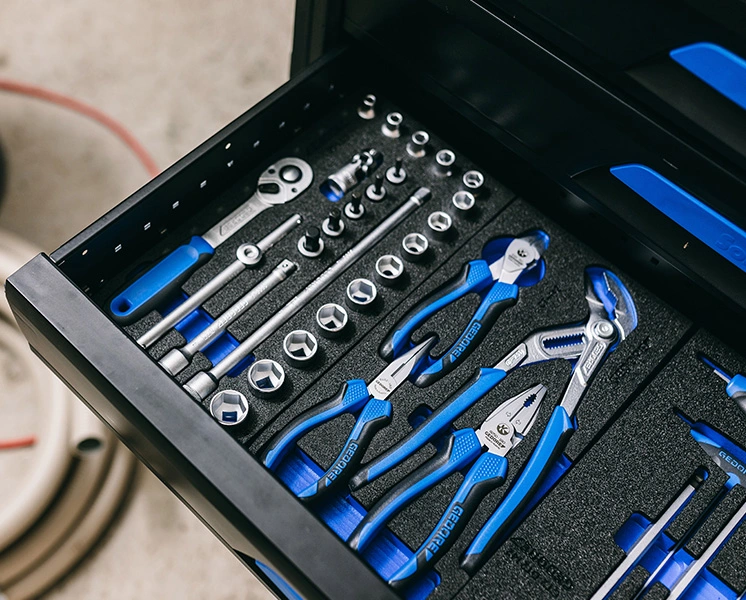 GEDORE tool assortment with pliers, ratchet and sockets in a tool trolley drawer