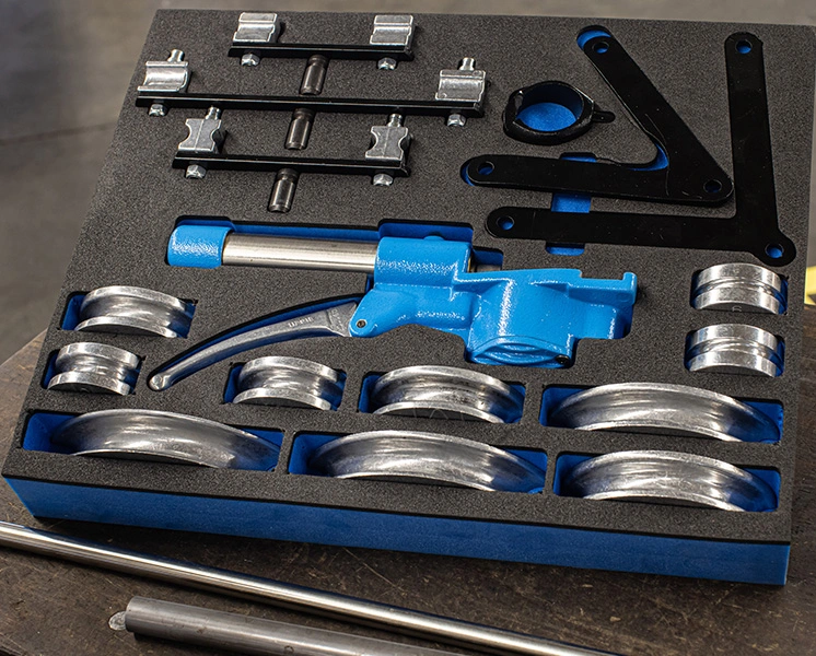 GEDORE pipe bending tool with bending formers in a tool insert